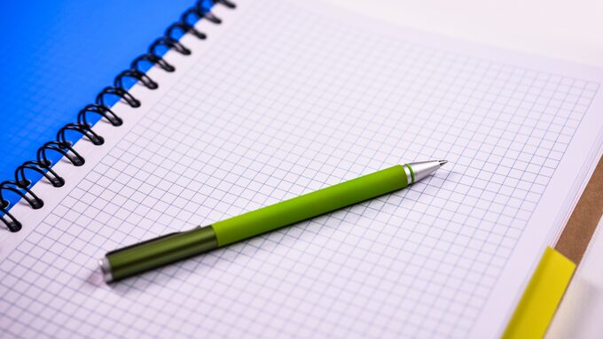 open-notebook-with-pen.jpg